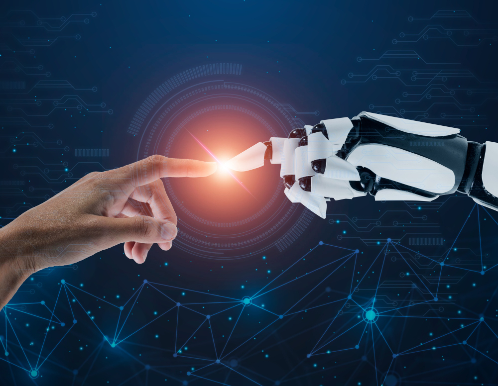 Human hand connecting with AI hand, symbolizing collaboration and trust between people and intelligent automation